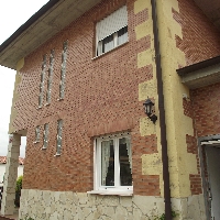 CHALET ADOSADO DOS PLANTAS CON JARDÍN Y GARAJE