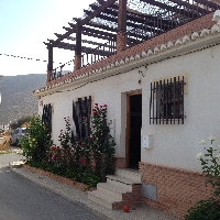 Casa adosada en esquina en el Romeral-Castell de Ferro