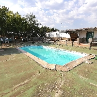 Casa de campo en venta con piscina en Sierra de Fuentes Casa de campo en venta con piscina en Sierra de Fuentes