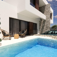 Urbanización moderna en Dolores de 8 chalets semi-adosados.