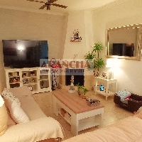 Planta baja en venta con patio y terraza en Chipiona