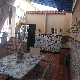 un patio barbacoa y  lavadero